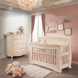 Pink Baby Room with a white brick wall, a dresser and crib in linen