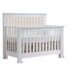 White crib with channel tufted headboard panel in talc