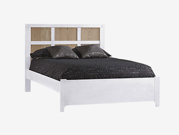 White double bed with natural wood colored panels and black sheets