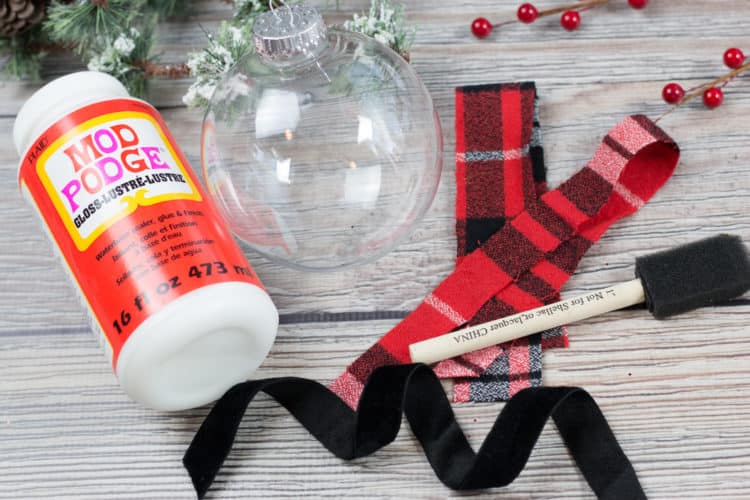 christmas ornament red and black checkered ribbon and glue supplies